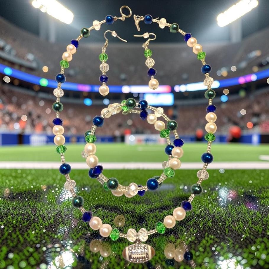Game Day Glam Jewelry Set with navy blue and green crystals, white pearls and silver football charm pendant, photographed on stadium turf