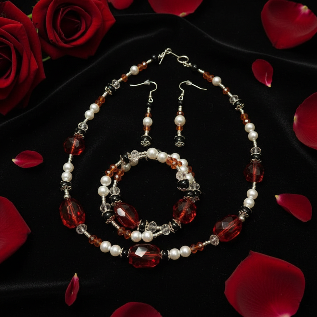 Red Rose Romance Jewelry Set on dark velvet with crimson rose petals and candlelight